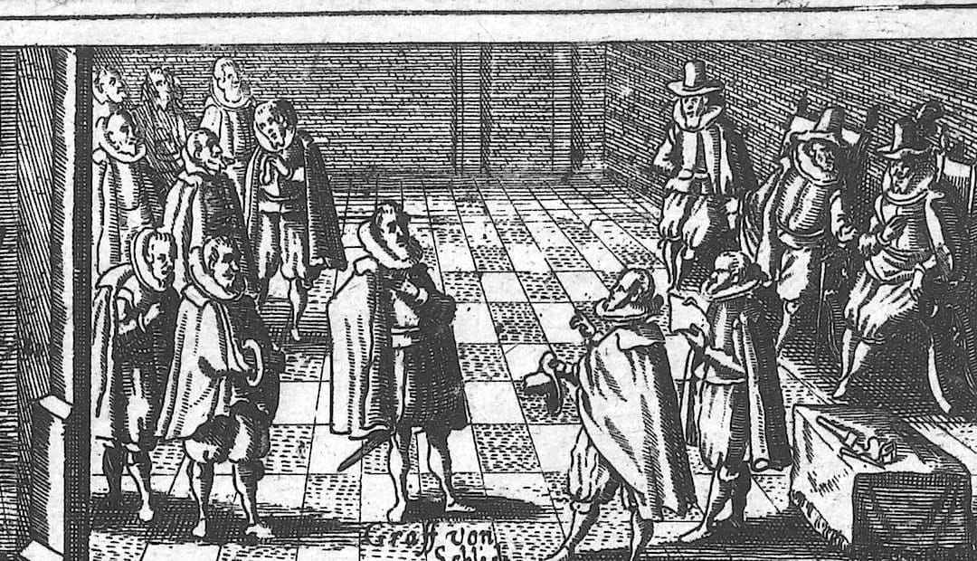 An engraving of men in cloaks and ruffs standing in a hall with a chequered floor; one figure is labelled as Count Schlick